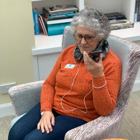 Bereavement Support volunteer listening to someone on their mobile phone